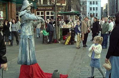 Silver statue woman and child